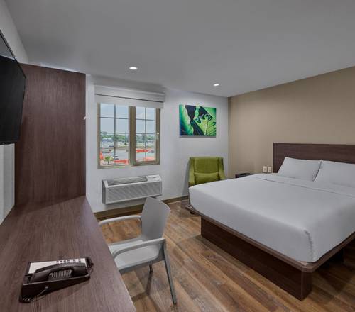 Queen size beds in all suites Extended Suites Tijuana Macroplaza Hotel